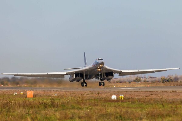 The bomber takes off from the airfield into the sky