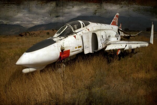 An old abandoned fighter on the field