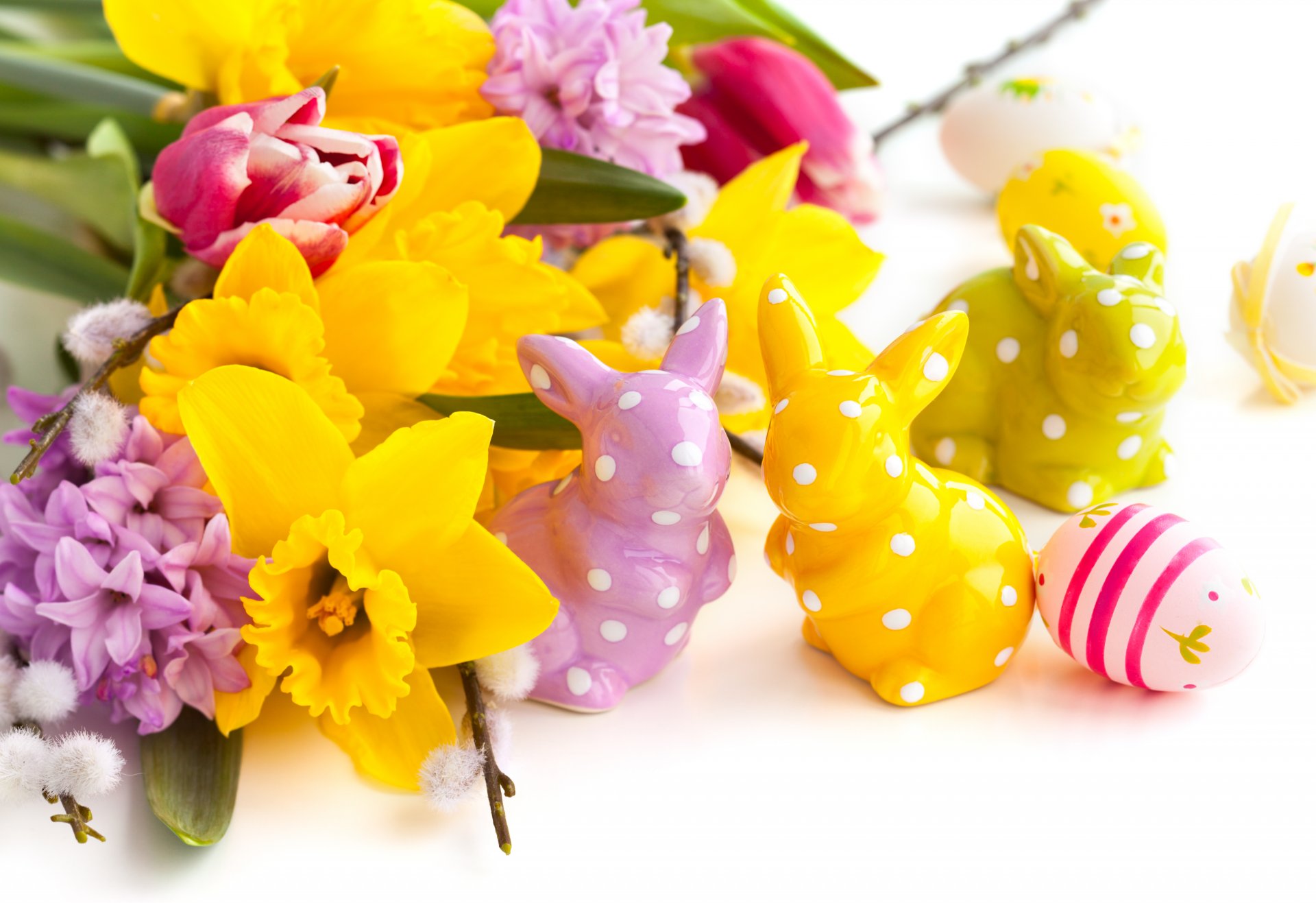 easter figurines rabbits eggs easter flowers daffodils tulips lilac holiday spring