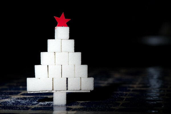 A tower of sugar cubes decorated with a star