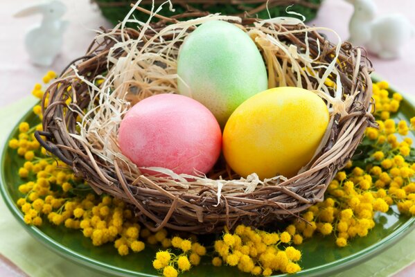 Easter eggs on a plate in mimosas