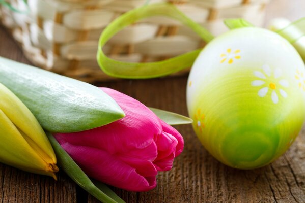 Easter egg, basket and tulips