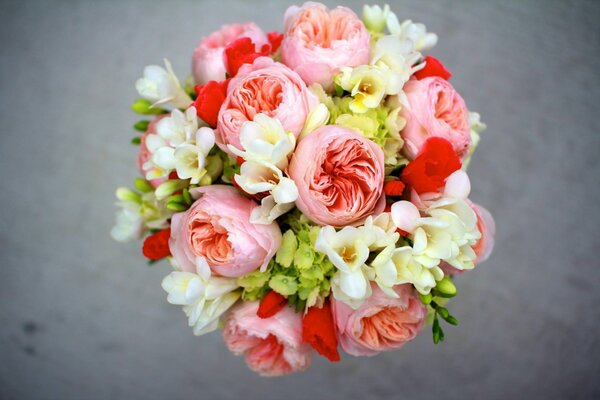 Bouquet composition of peonies and freesia