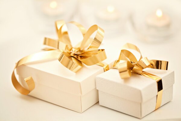 Gift boxes with gold ribbons