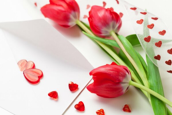 Red tulips with red hearts