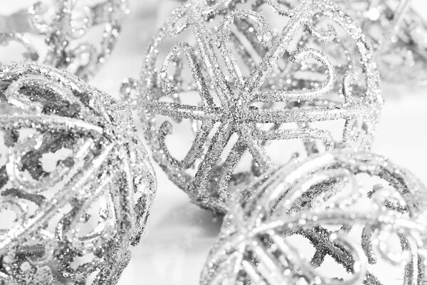 Silver Christmas tree toy on a white background