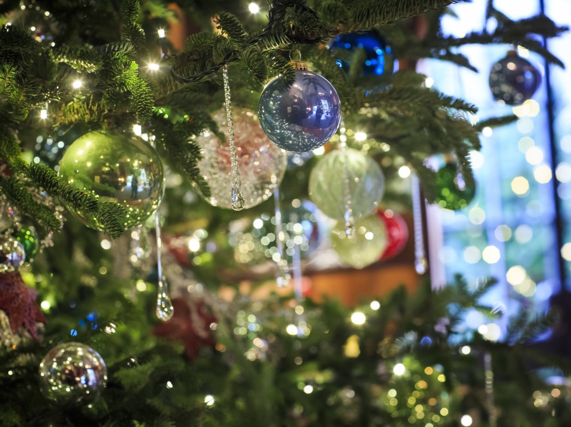 christmas tree holiday decoration balls . icicles light