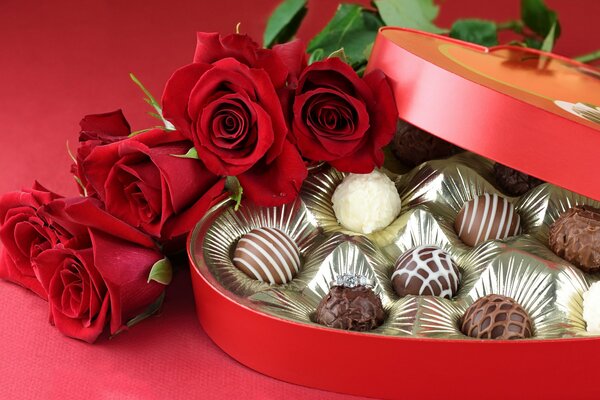 Romantic photo with flowers and chocolates