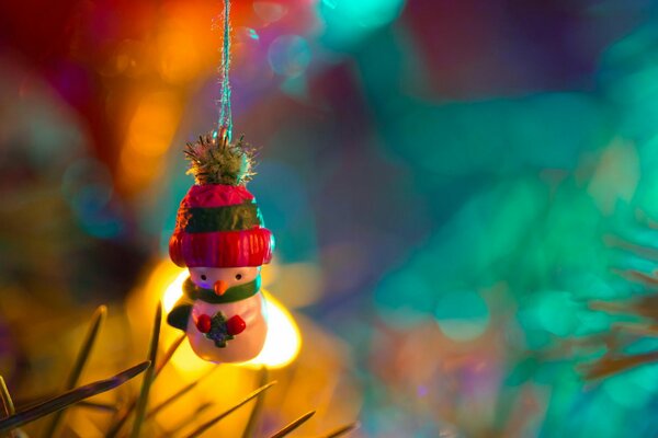 Holiday toy: snowman on the Christmas tree