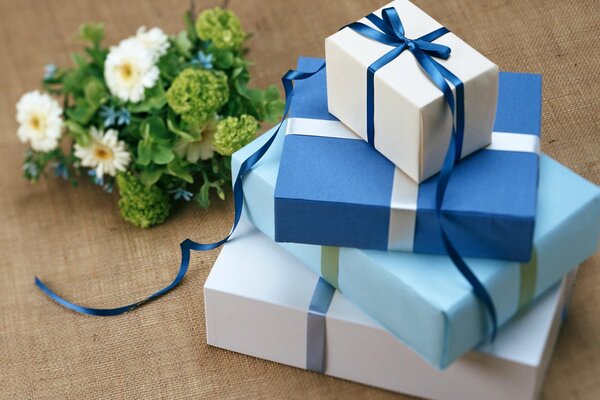 Gifts. blue gift wrapping. flowers