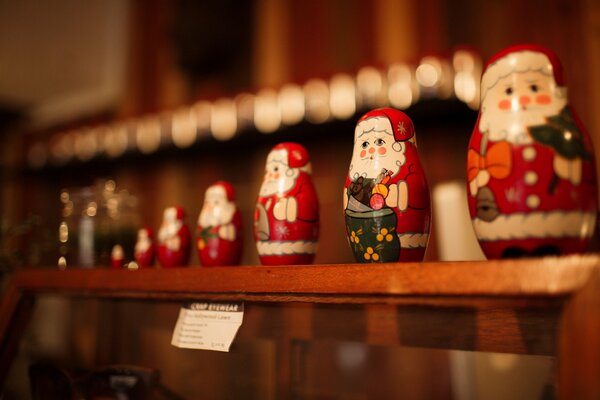 Souvenir Santa Claus figurines standing on the shelf