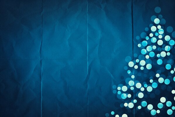 Christmas tree with balloons on a blue background