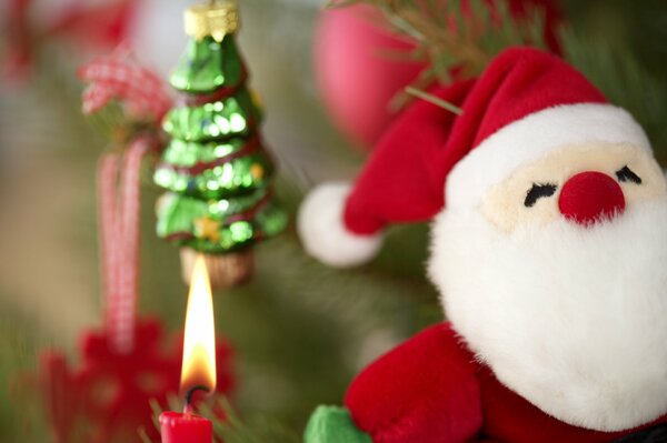 Santa s toy on the Christmas tree