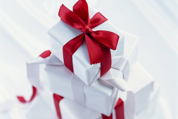 White boxes with red bows