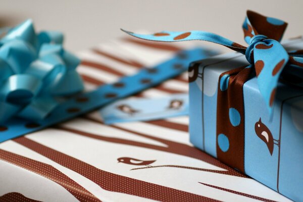 Blue gift wrap with ribbons