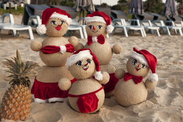 Sand snowmen. Happy New Year