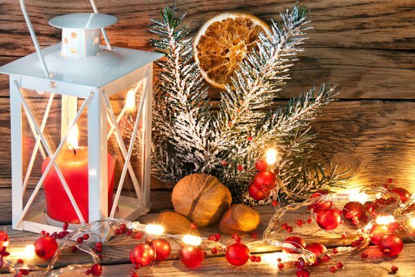 Decorations and a lantern with a candle for the new year