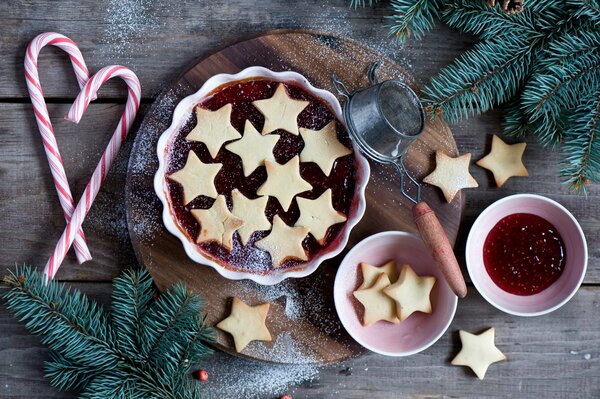 Christmas treats with a Christmas tree on the table