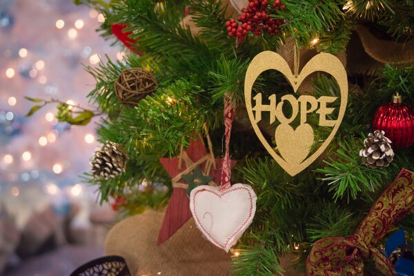 Lanterns and hearts decorate the Christmas tree