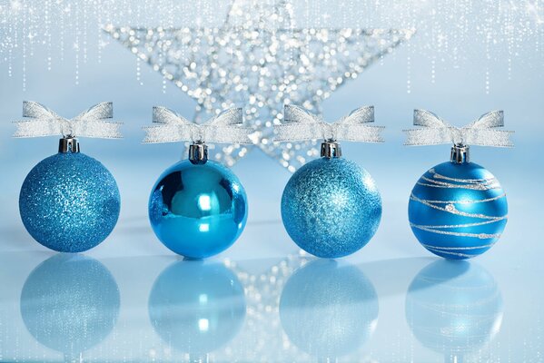 Christmas tree toys. Blue balls with bows