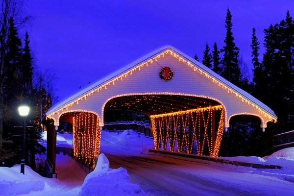 Decorated winter bridge with lanterns