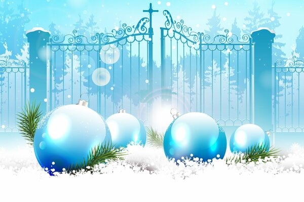 Christmas balls in the snow on the background of the opening gate