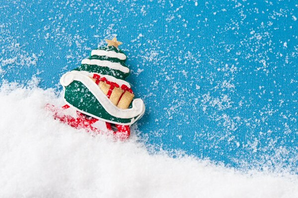 Christmas tree on Santa sleigh in the snow
