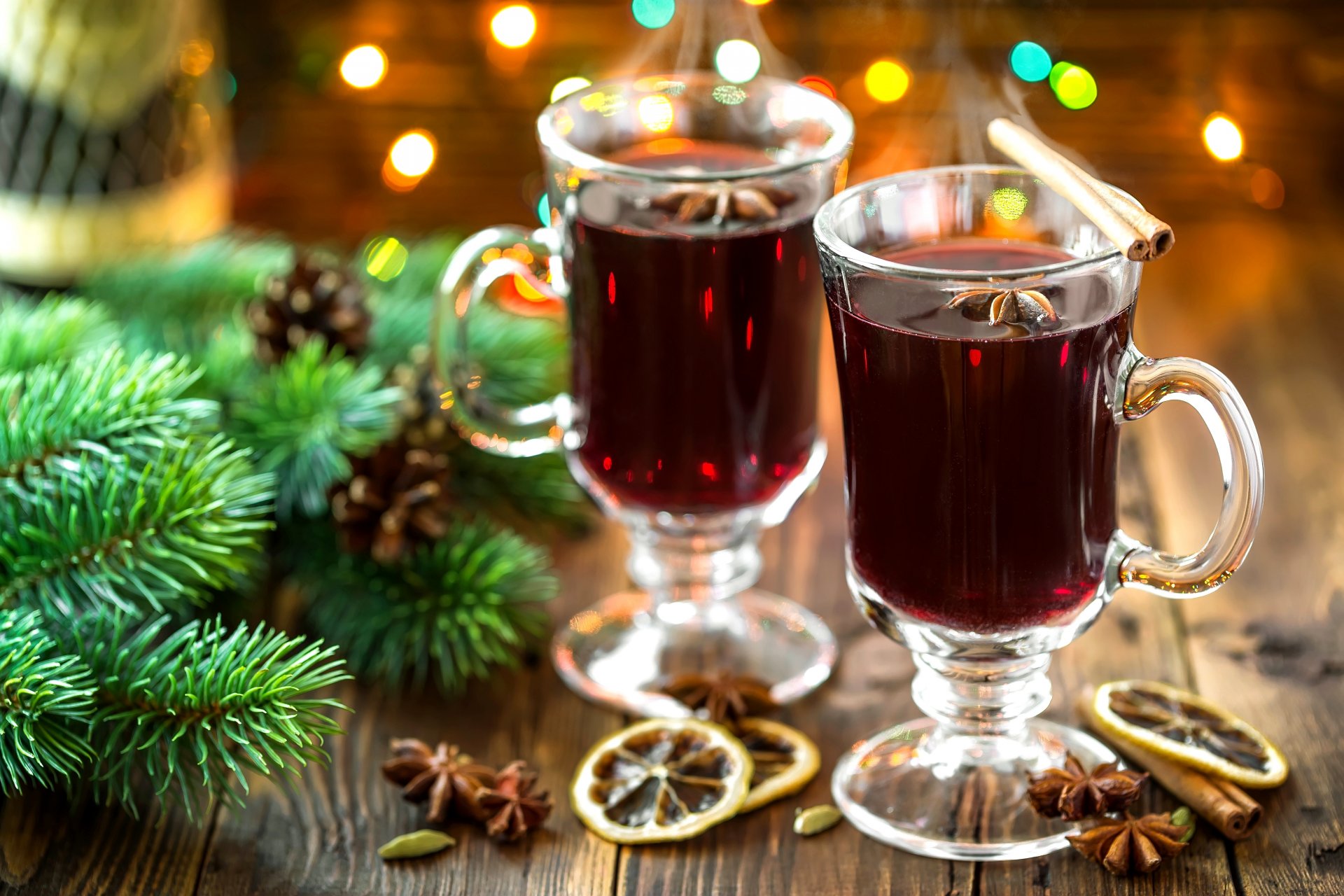 mulled wine wine drink lemon spices cinnamon sticks star anise anise branches spruce cone holidays winter lights bokeh new year christma