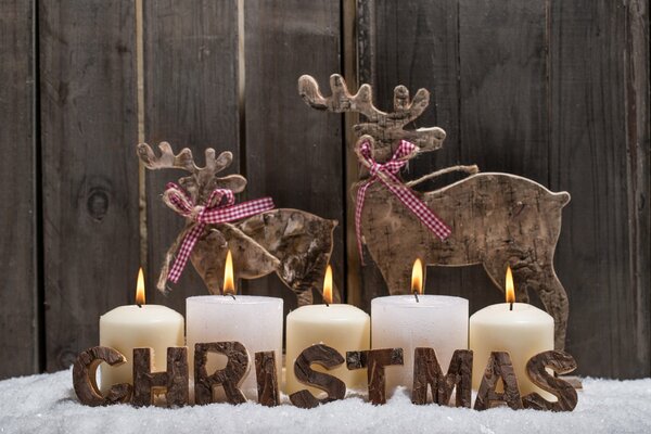 Christmas decor with candles and reindeer