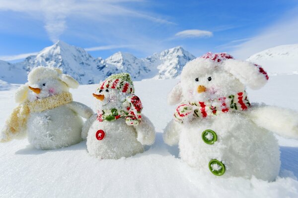 Snow family of white snowmen