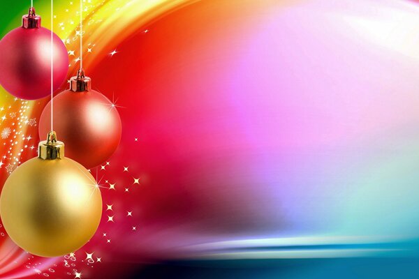 Rainbow painted wall with three glass Christmas balls