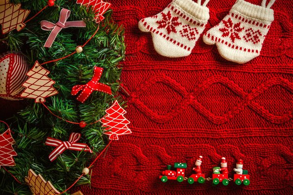 Christmas wreath and warm mittens