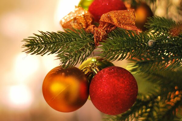 Christmas colorful balloons on the Christmas tree branch