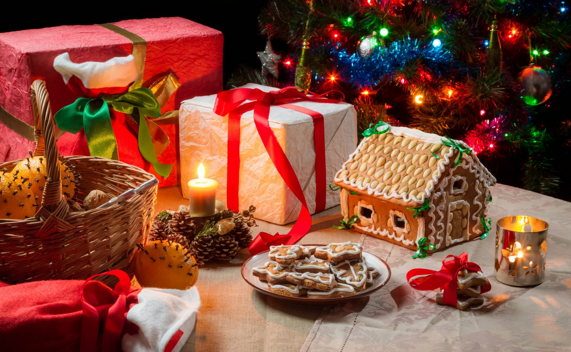 natale regali candele biscotti casa di marzapane cesto arance