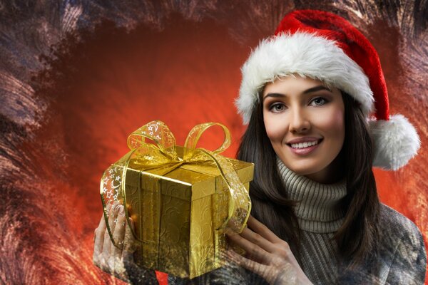 Das Neujahrsbild eines braunäugigen Mädchens im Pullover mit einer Geschenkbox auf dem Hintergrund eines frostigen Musters