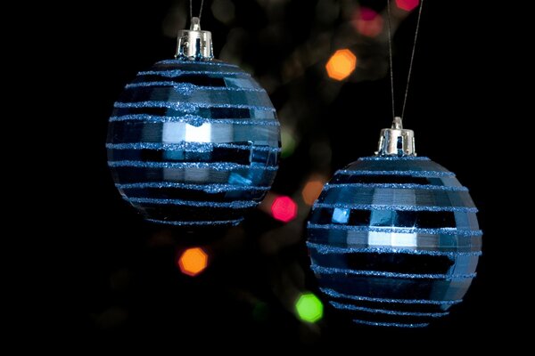 Stylish Christmas photo. Photo for the New Year with a ball and a bokeh effect