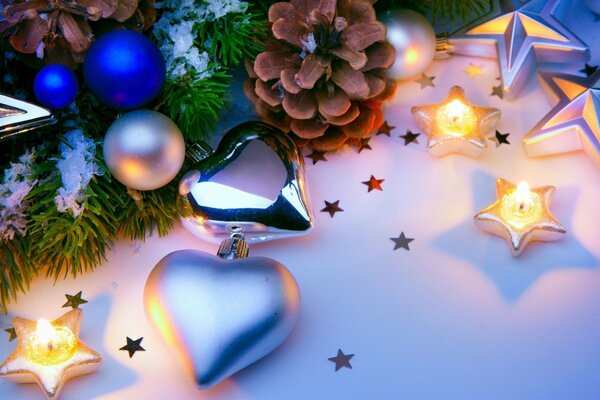 Silver candles in the shape of stars