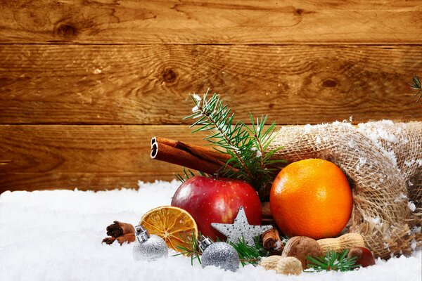 Snow-covered tangerines at Christmas