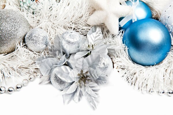 Christmas decorations with flowers on tinsel