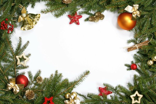 Christmas frame with a fir branch and balls on a white background