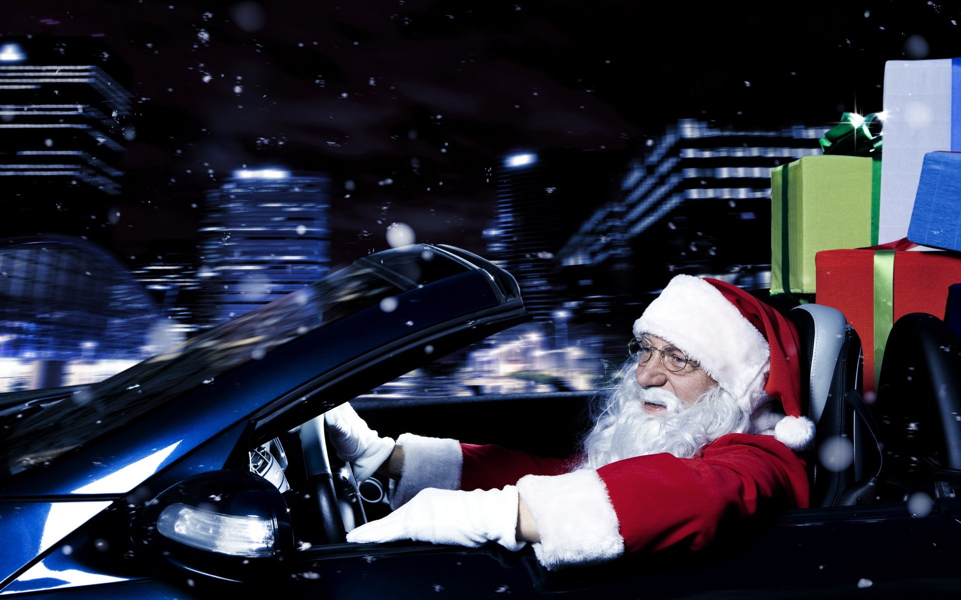 new year father christmas machine traveling by car black background gift