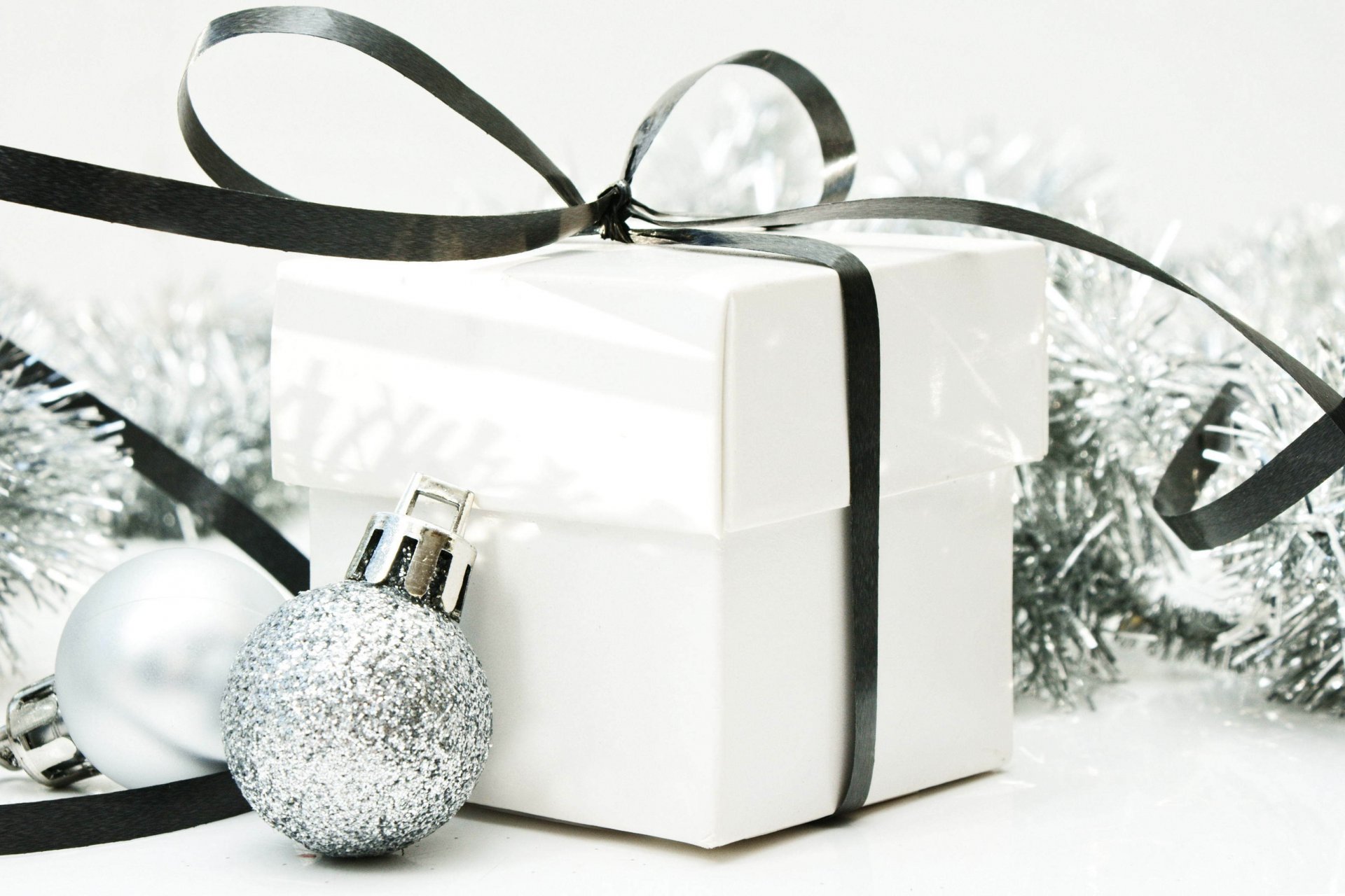 new year christmas holiday bulbs silver present box white bow belt