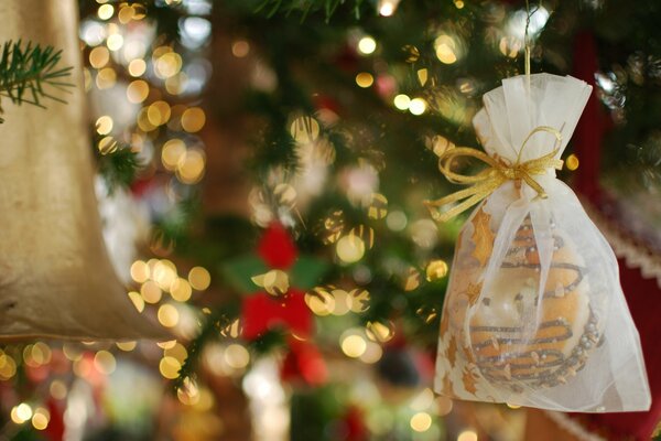 Festive mood. Garland on the Christmas tree