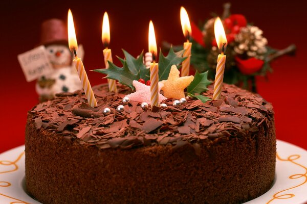 Pastel de Navidad de chocolate con muñeco de nieve