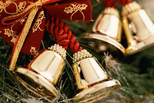 Campanas de viento con lazo rojo para Navidad