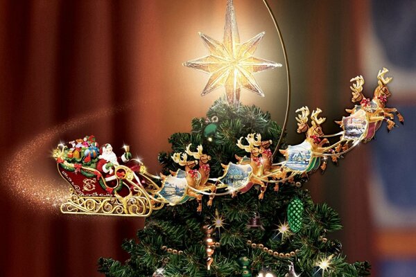Trineo con renos en el árbol de Navidad
