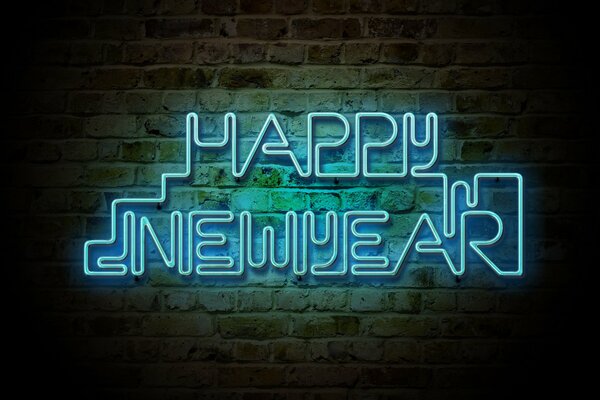 Neon inscription on the background of a brick wall on the theme of the new year