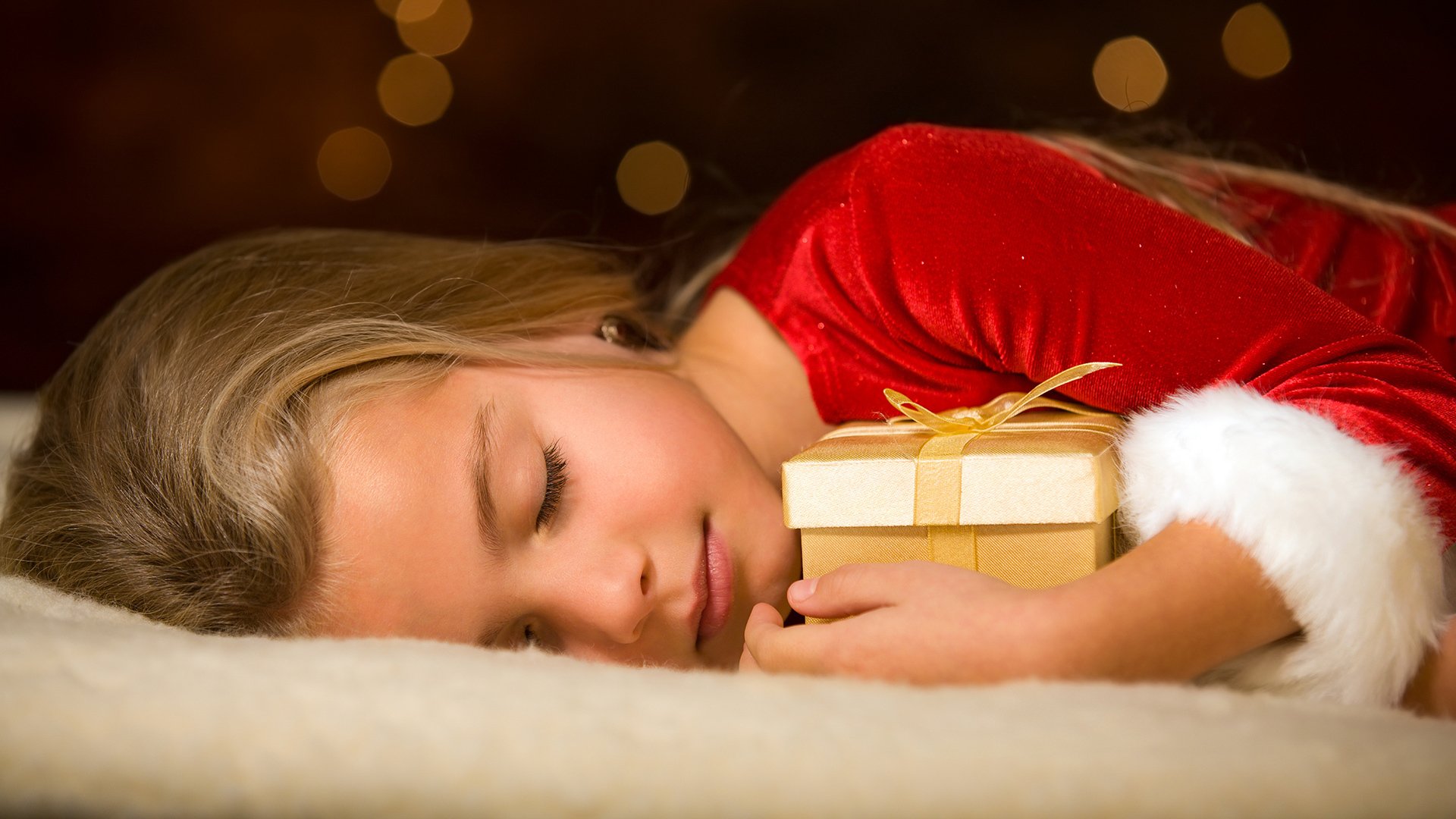 niña regalo sueño vacaciones