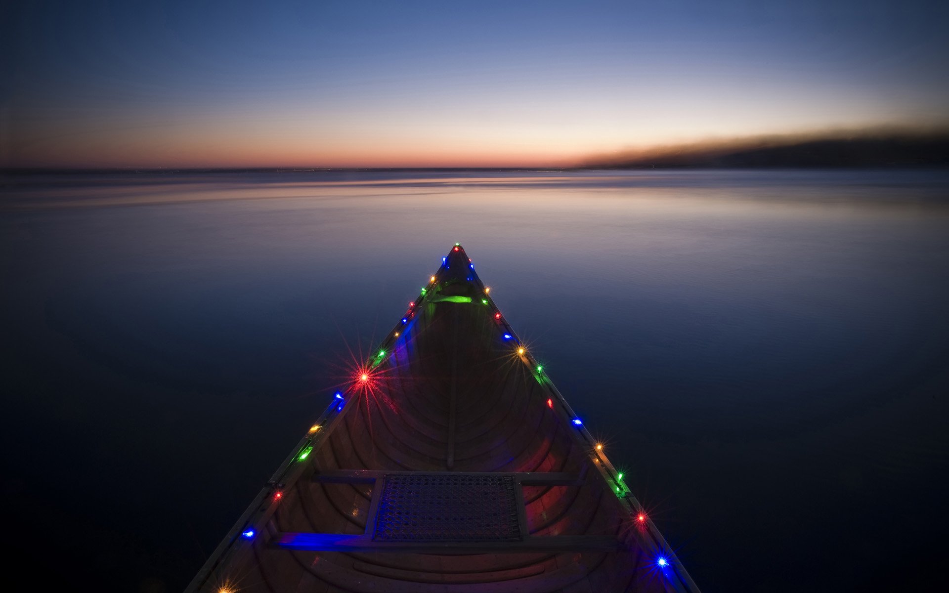 boat in lights river raznotsvete