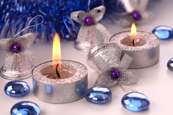 Shiny burning candles New Year s Eve